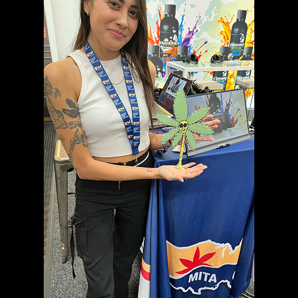 MITA rep talks industry trade with Weed Dude at a tiny booth with a big heart MITA rep talks industry trade with Weed Dude at a tiny booth with a big heart