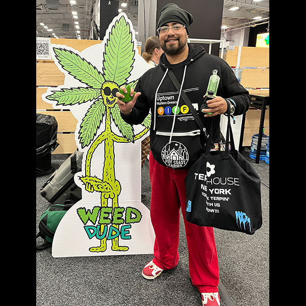 Weed Dude fits right in with illicit booth, cheers to YK's camera / vape / microscope device! at Hall Of Flowers NYC Weed Dude at Hall Of Flowers NYC 2026